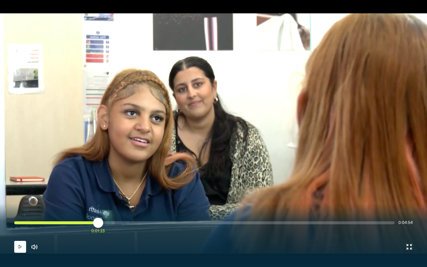 Student and staff in ITV News video